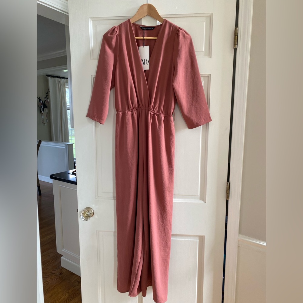 NWT Zara jumpsuit. Size S. Nude pink, loose fit, never worn, with black belt.